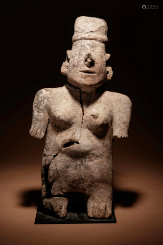 A Nayarit Terracotta Standing Figure Height 21 inches.