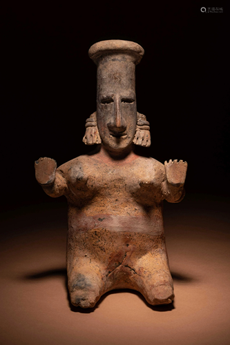 A Jalisco Terracotta Standing Female Figure Height 10