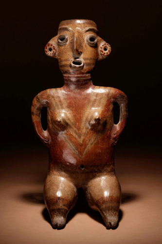 A Zacatecas Painted Terracotta Seated Female Height 15