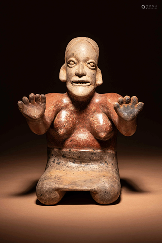 A Jalisco Terracotta Seated Female Figure Height 12