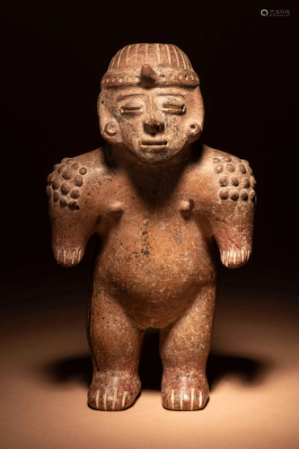 A Jalisco Terracotta Standing Male Figure Height 12