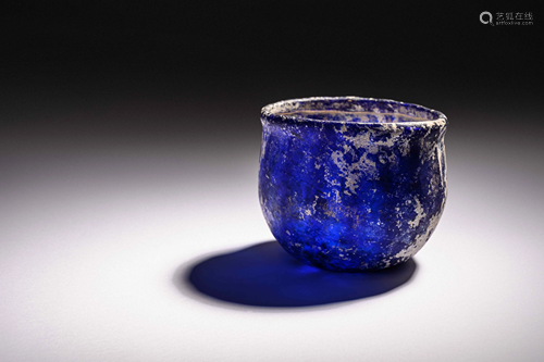 A Roman Blue Glass Ribbed Bowl Height 3 1/4 x diameter