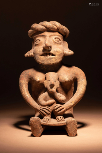 A Colima Terracotta Seated Mother and Child Figure