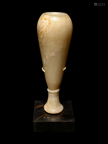 An Egyptian Alabaster Vessel Height 6 inches.