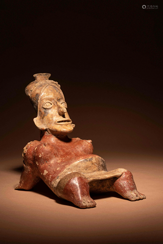 A Jalisco Reclining Female Figure Height 9 1/2 inches.