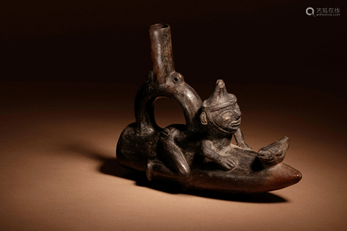 A Moche Stirrup Vessel of Man on Reed Boat with Fish