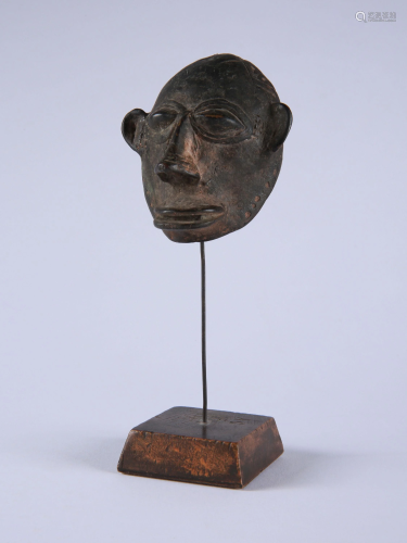 A Lobi (?) Miniature Bronze Mask