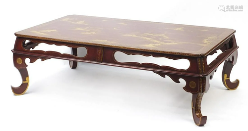 Chinese red lacquer style coffee table gilded with