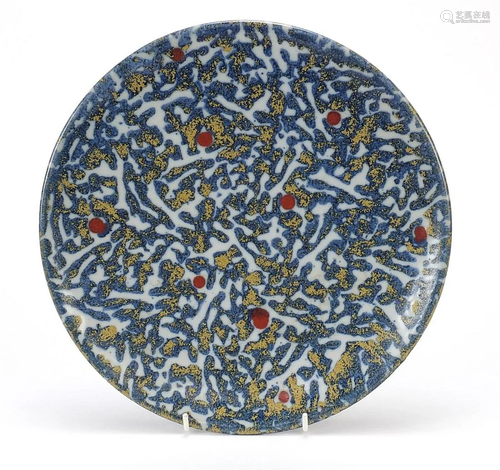 Chinese porcelain plate having a spotted blue glaze,