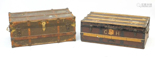 Two vintage wooden bound travelling trunks with