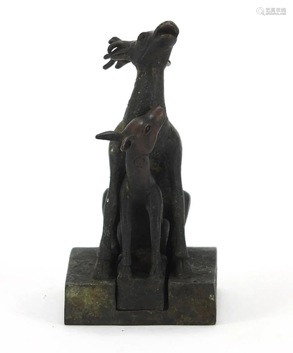 Chinese patinated bronze two piece seal in the form of