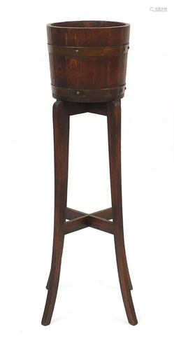 Copper bound oak bucket on stand, 94cm high