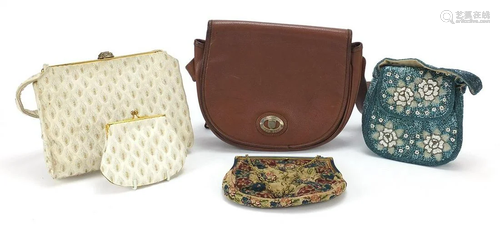 Four vintage and later ladies bags including Burberrys