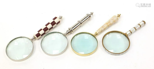 Four magnifying glasses including an example with