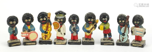 Nine hand painted Robertson figures including a Traffic