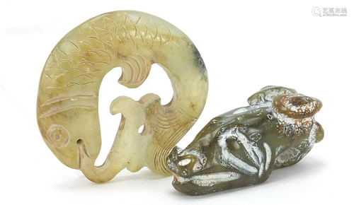 Two Chinese green jade carvings of fish, the largest