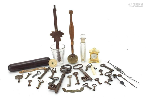 Objects including selection of vintage keys and clock