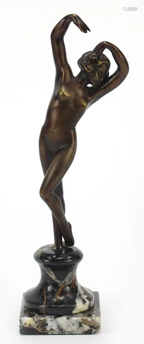 Art Deco style bronzed figurine of a nude female raised