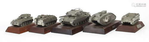 Five Hart model metal tanks raised on wooden plinth