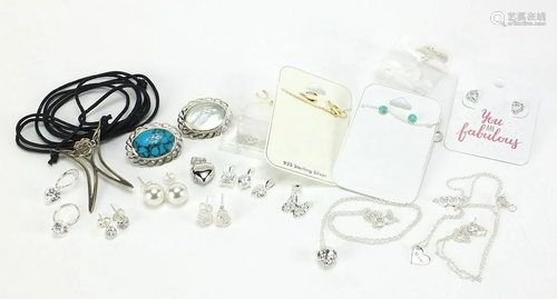 Silver jewellery including two cabochon stone brooches,