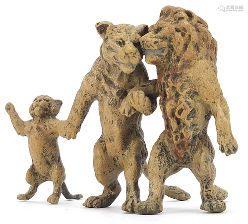 Cold painted bronze group of a lion, lioness and cub in