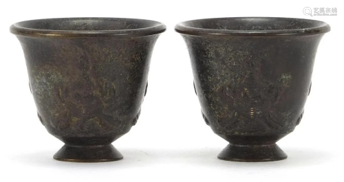 Pair of Chinese patinated bronze tea bowls, each