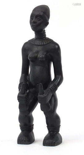 Tribal interest patinated bronze figure of a nude