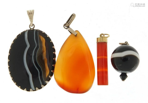 Two Scottish agate pendants and two carnelian pendants,