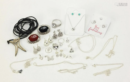 Silver jewellery including two cabochon stone brooches,