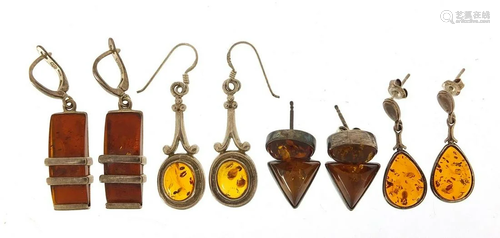 Four pairs of silver natural amber earrings, the