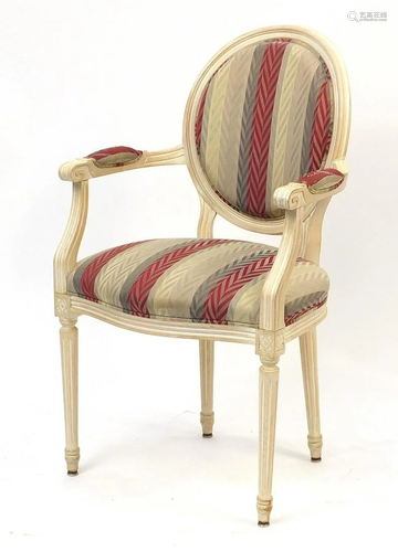 French style cream armchair with striped upholstery on