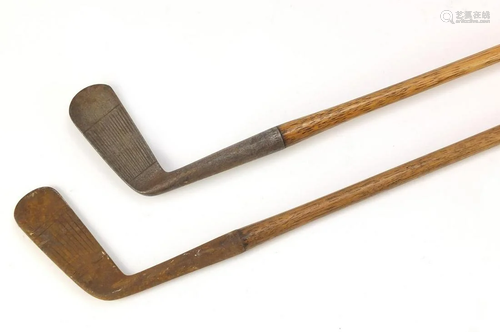 Two wooden shafted putters including one by H E Pearse