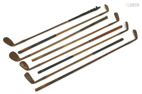 Eight wooden shafted golf clubs including Ernest Hooker