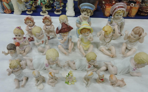 Lot of 27 bisque piano babies and kewpies