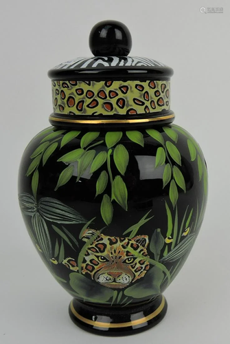 Fenton black glass covered jar with tiger,