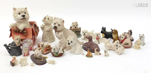 Collection of model dogs, predominantly Westies