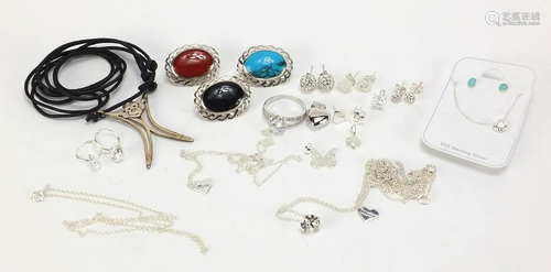 Silver jewellery including three cabochon stone