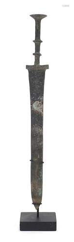 Chinese/Islamic patinated bronze short sword on display