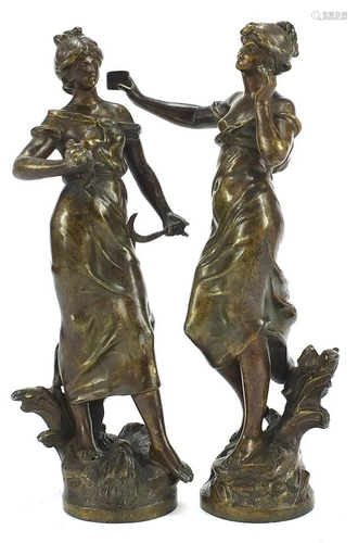 Pair of patinated spelter figures, the largest 31.5cm