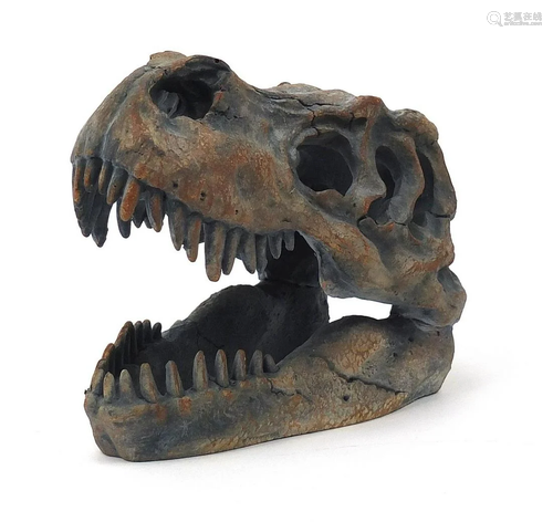 Modern decorative model of a dinosaur skull, 19cm in