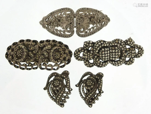 Four silver coloured metal marcasite two piece clips,