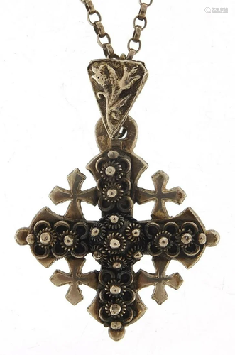 Silver Celtic cross pendant on an unmarked silver