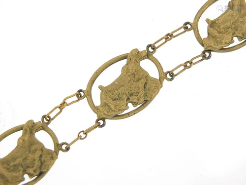 Gold coloured metal dog design bracelet, 16cm in