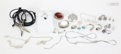 Silver jewellery including two cabochon stone brooches,