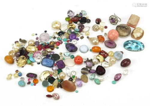 Loose gemstone including amethyst, cameos, garnet and