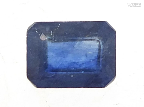 Rectangular dark blue sapphire gemstone with