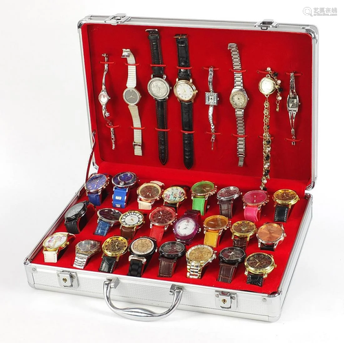 Thirty two ladies' and gentlemen's dress wristwatches