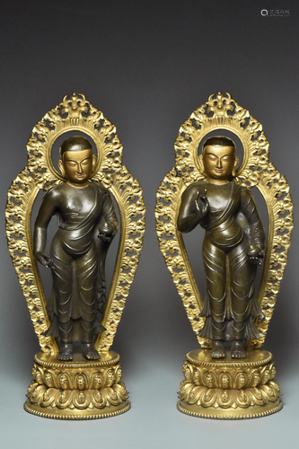 A PAIR OF INSCRIBED GILT BRONZE ARHATS 15TH C