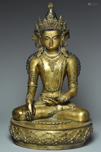 A GILT BRONZE FIGURE OF BUDDHA 17TH C