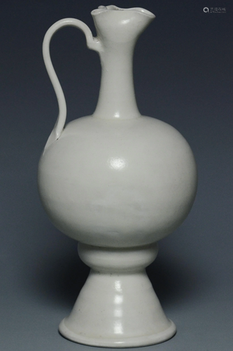 A WHITE GLAZED EWER